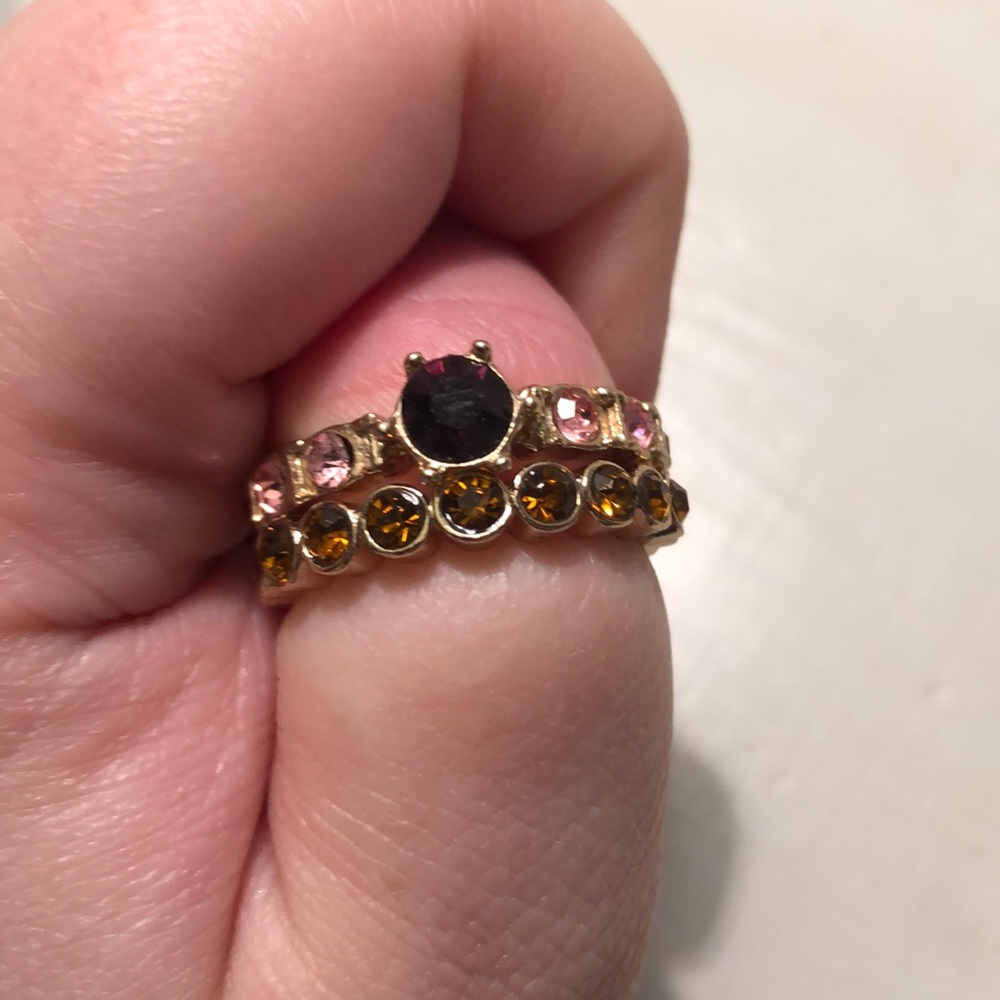 2 rings with amber and pink stones